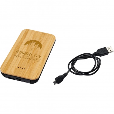 Logotrade Firmengeschenke das Foto: Future 6.000 mAh kabellose Powerbank mit Ladefunktion aus Bambus/Stoff