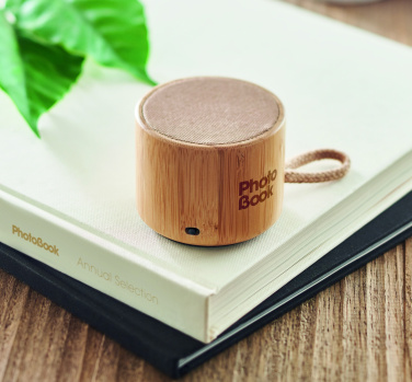 Logo trade promotional giveaway photo of: Round bamboo wireless speaker